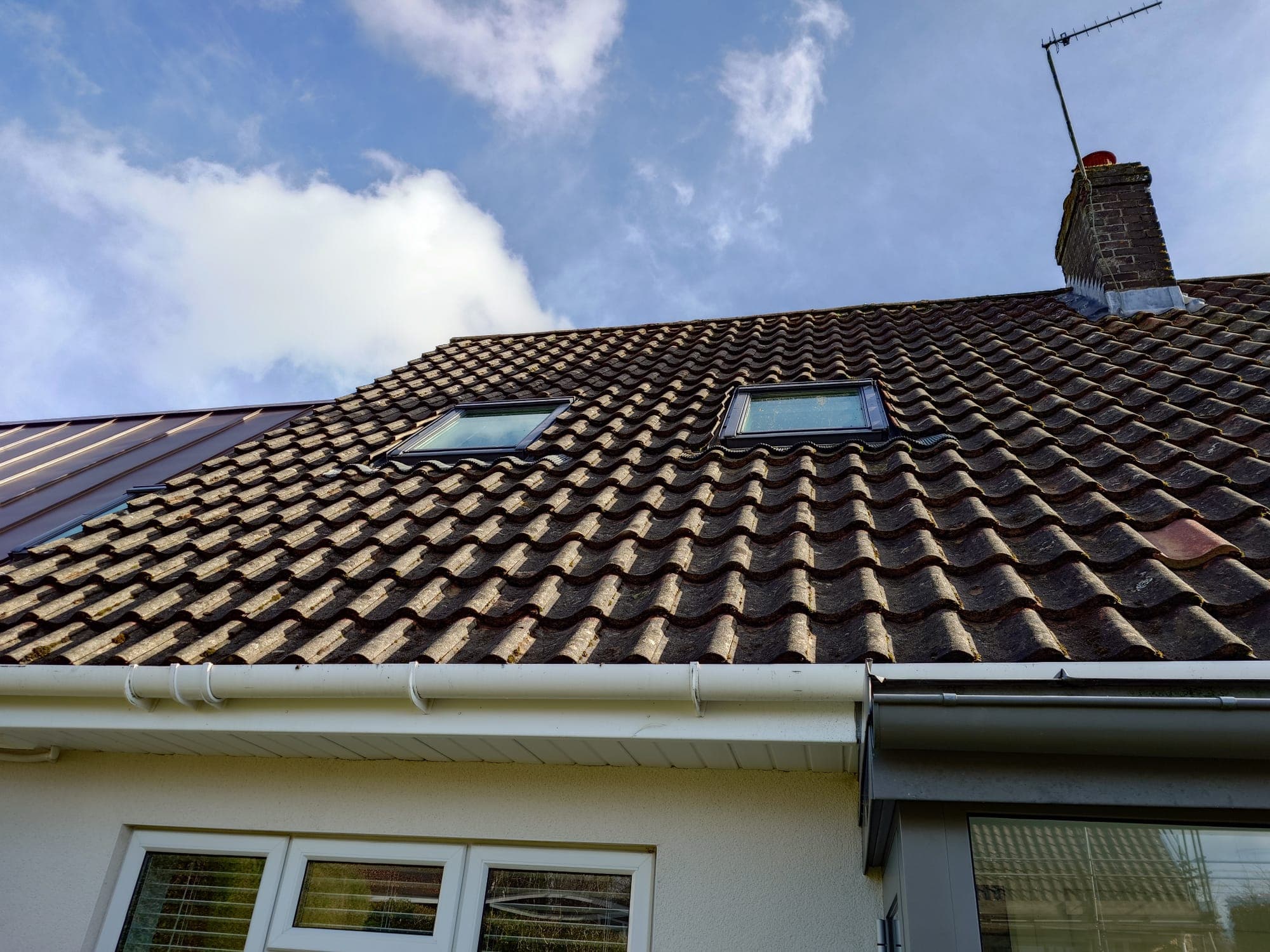 A Cleaned roof with velux windows.